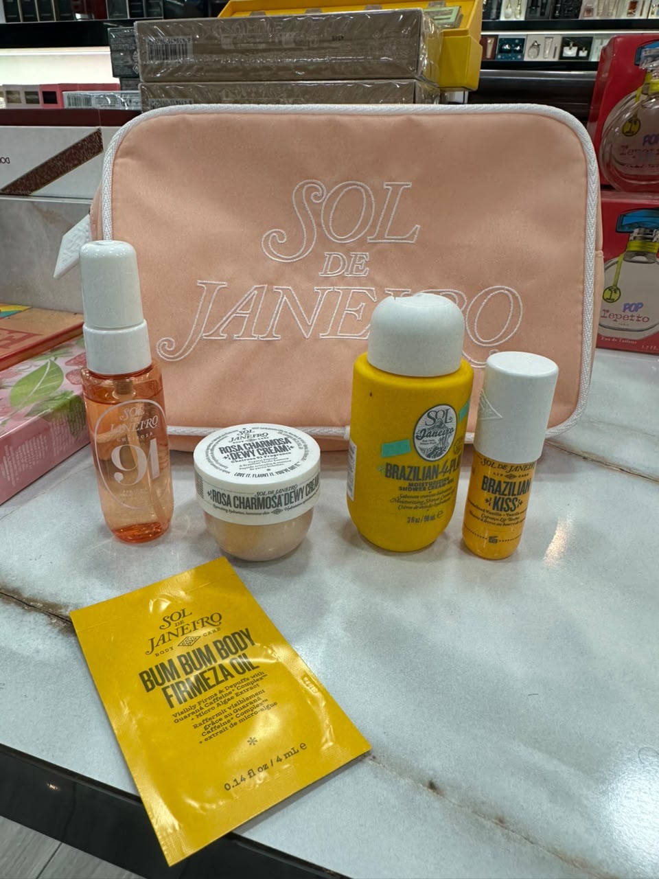 617f7270-d6fb-4fb5-9ee2-5a0c48742a42-2 Sol De Janeiro 5 Piece Travel Size Holiday Set & Bag Brand New – Image 1